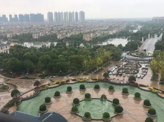 Qidong Warm House Apartment Hotel
