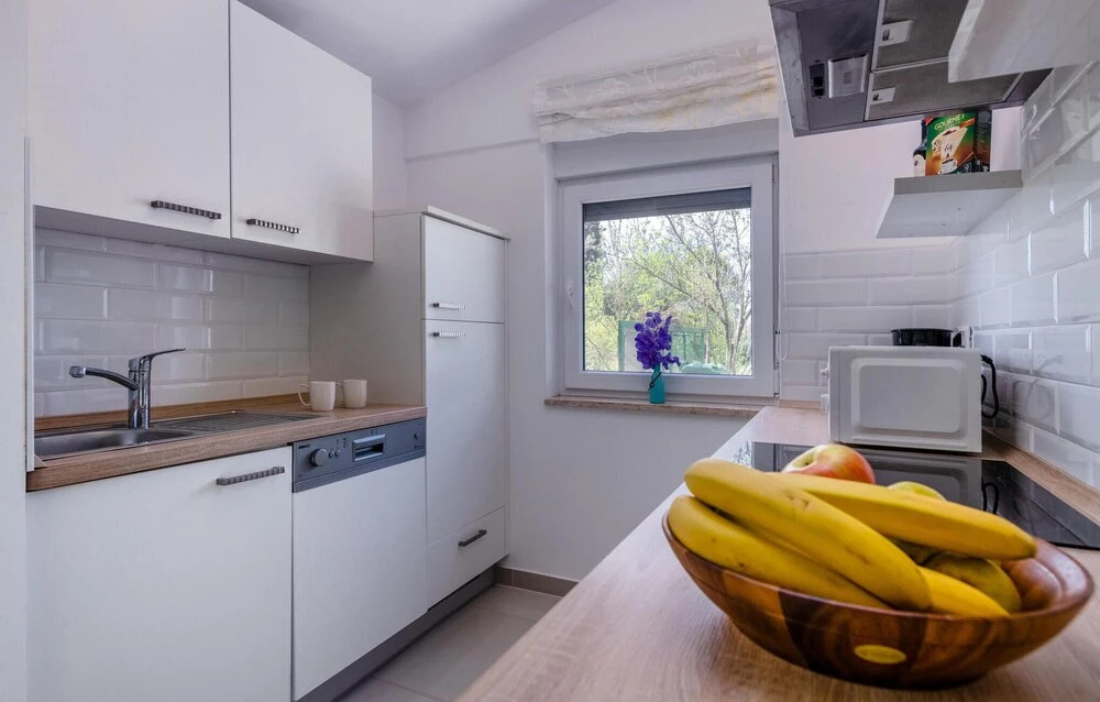 Nice Home in Loborika With Outdoor Swimming Pool, Wifi and 2 Bedrooms