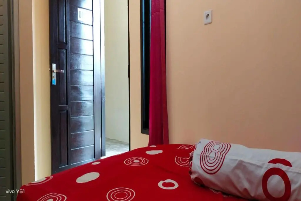 SPOT ON 91249 Baroqah Guest House