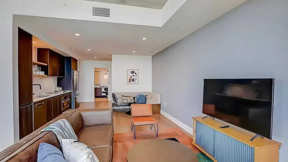 2 Luxury Condos, 1 Block From Rainey St New High Rise w/ Rooftop Pool & Gym