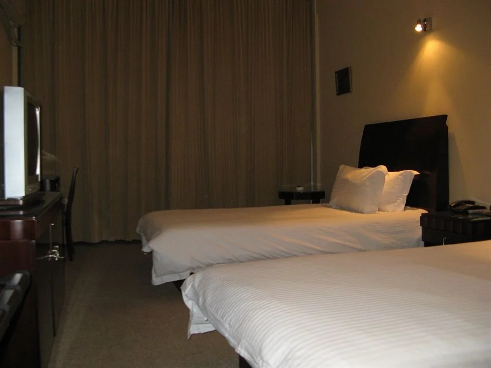 Baolong Homelike Hotel (Luojing Branch)
