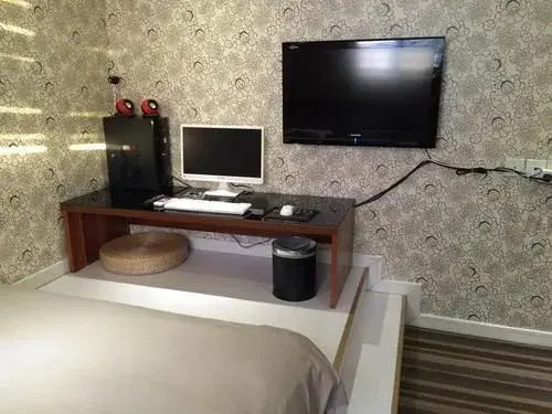 Yuhao Theme Hotel (Dongying Baolong City Plaza)