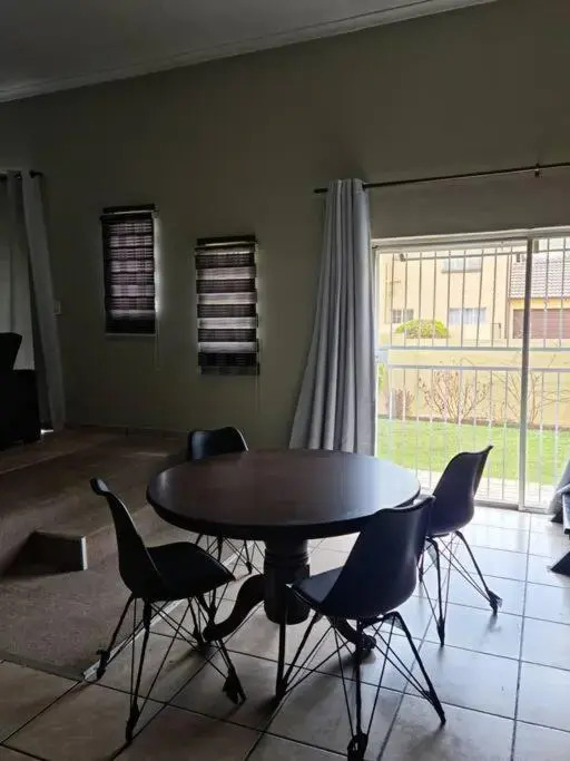 Justin's Place Lounge. An Exceptional Home with no Load Shedding, by The Grove Mall and Wilgers Hospital.