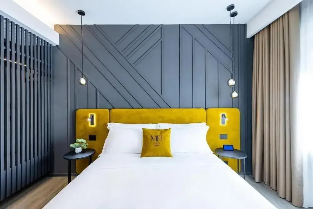 MH SUITES Plebiscito