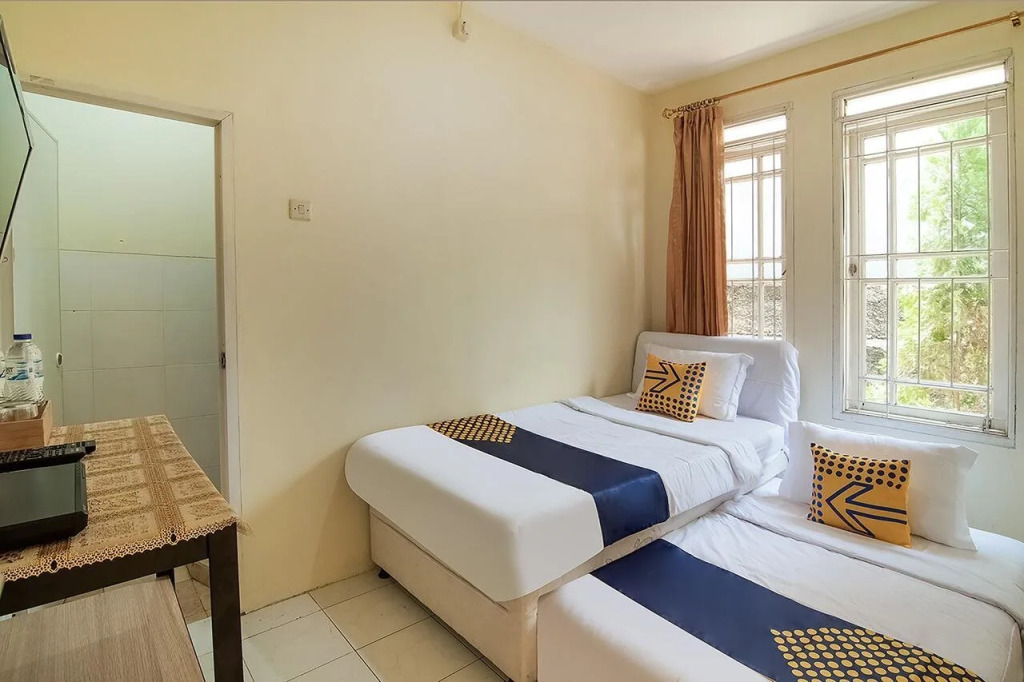 Spot On 3988 Kost Carmelia Baranangsiang Syariah