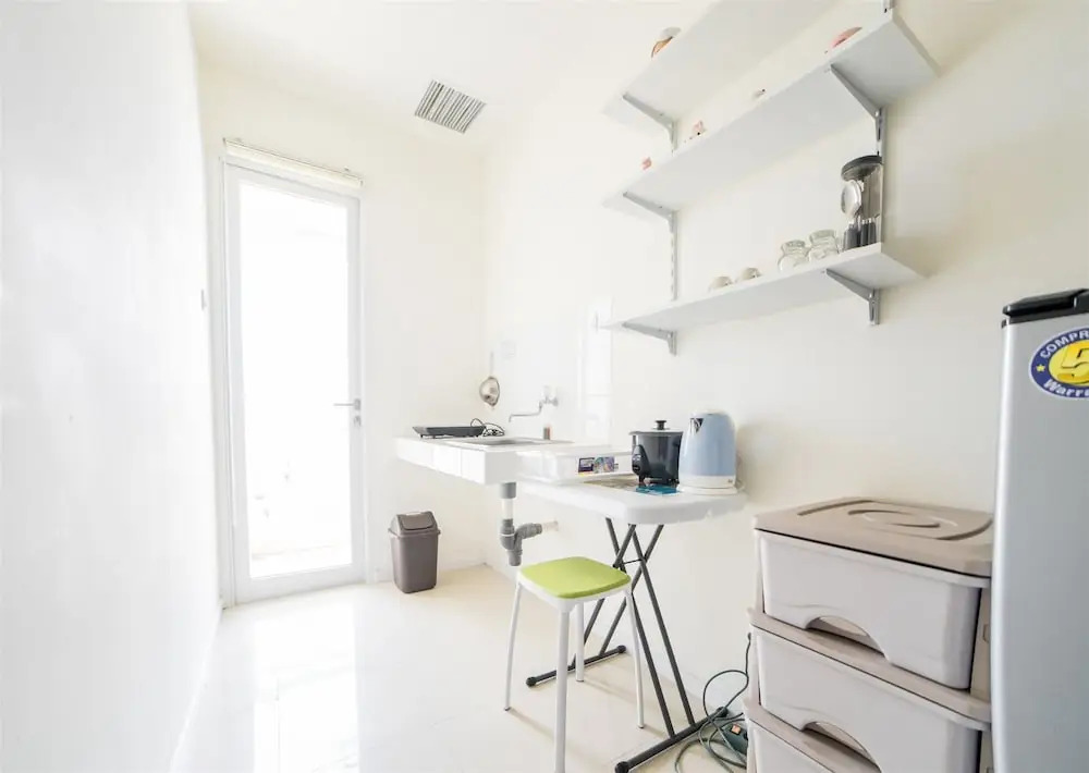 Minimalist Apartment with Sofa Bed at Parahyangan Residence