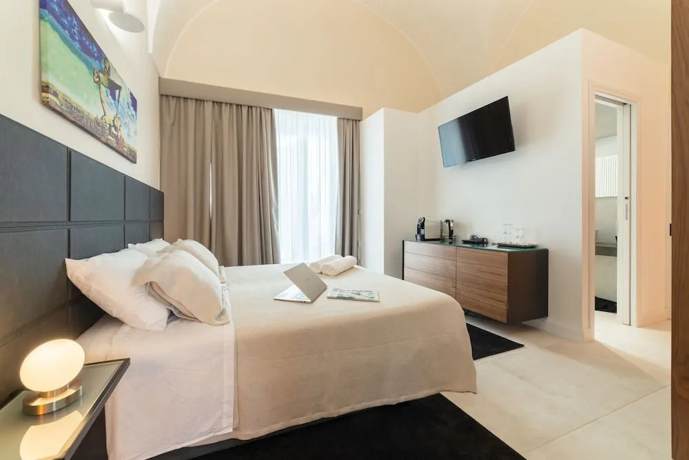 Y Arcillos Luxury Rooms CIN ITO75O35B4OOO468O2