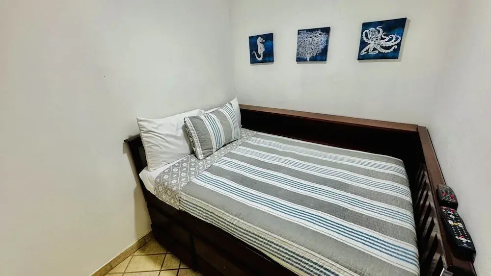 Spectacular 1 1/2 Bedroom Condo on Sandy Beach at Las Palmas Beachfront Resort 1 Condo by RedAwning