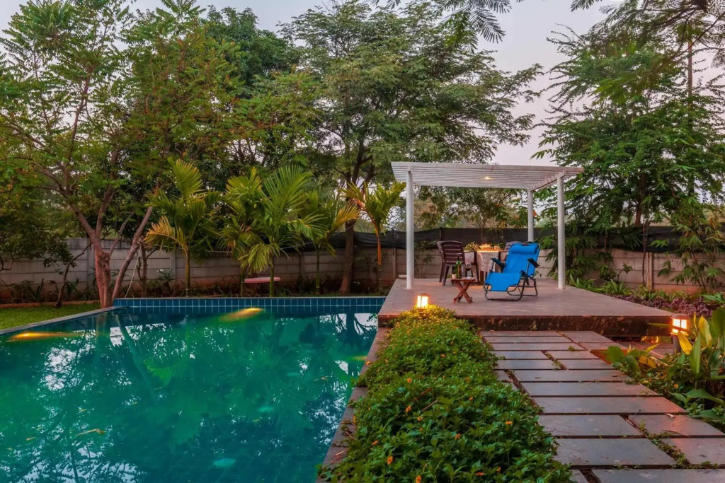 Morning Dew Retreat by StayVista - Modern interiors, Indoor games, Lush greenery, Pool & Gazebo await your escape