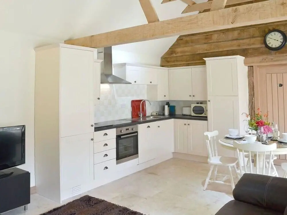 Luxury Cart Lodge set on the farm which featured in the 'Darling Buds of May'