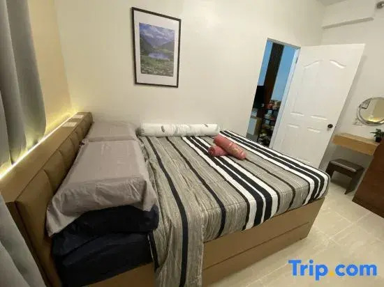 Seven-Eleven Inn 1BR Condo - Royal Oceancrest Mactan
