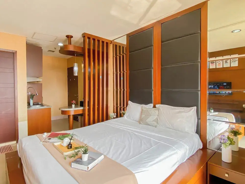 Warm Wood Accents Studio At Mangga Dua Apartment