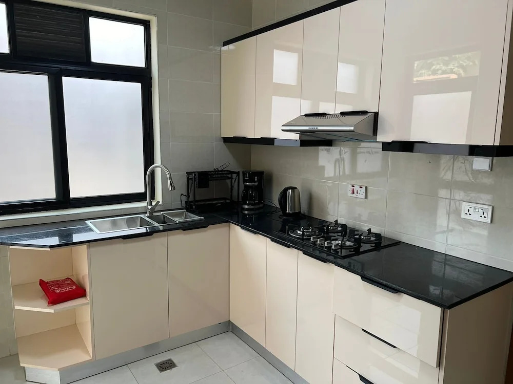 Q-Plus Apartments