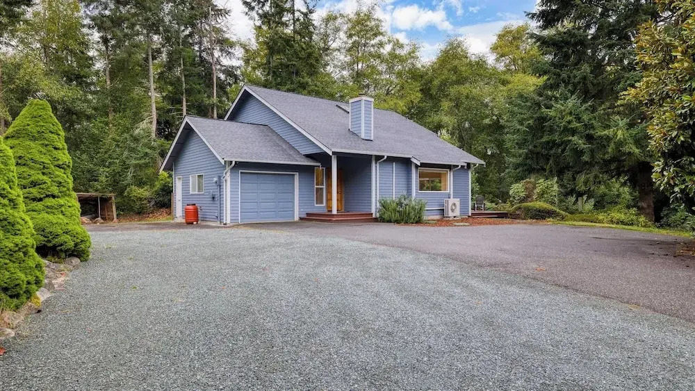 Forest Front Home w/ Fire Pit, Mins to Beaches, Wineries & Trails Cedarview Retreat by Avantstay