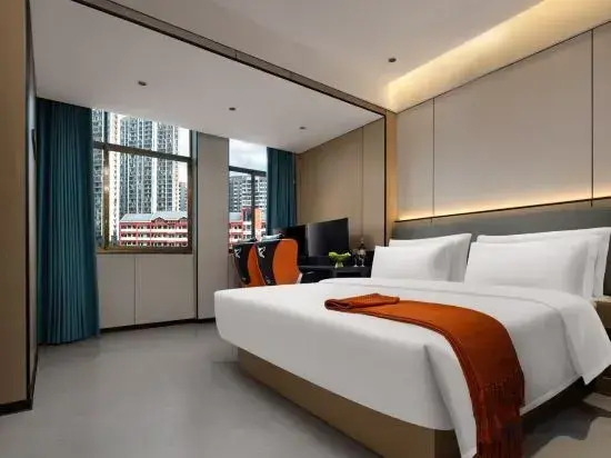 Yiyang Qianyi Hotel (North Branch of City College)