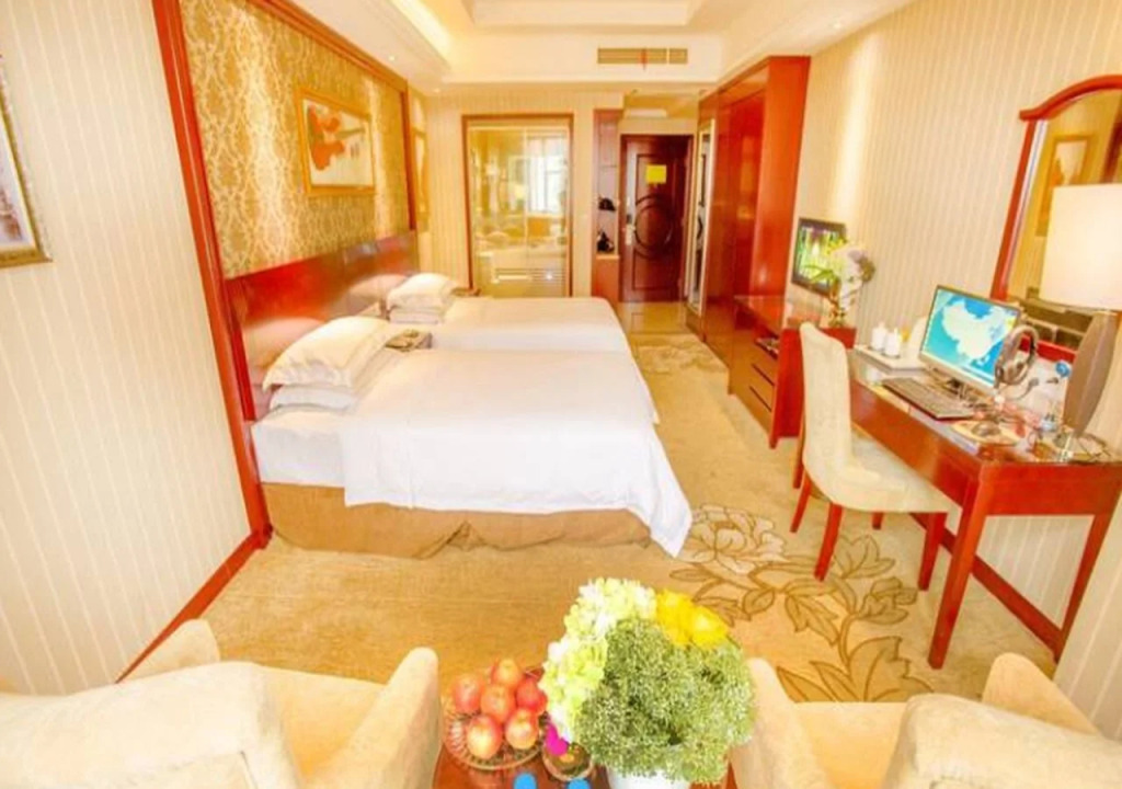 Vienna Hotel Xinyu Kaiguang