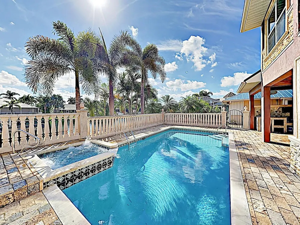 New Listing! European-style On Canal W/ Pool 4 Bedroom Home