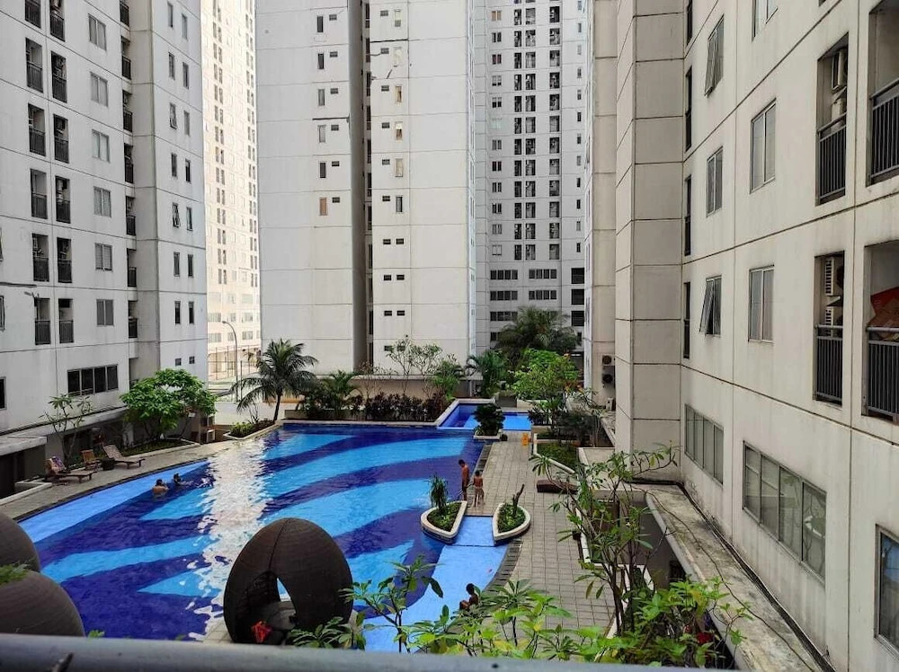 Toptravel Bassura City