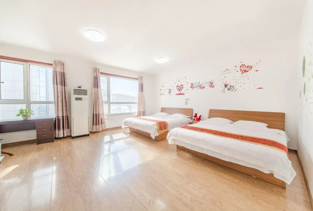 Xinghai Haiyue Bay Suites Apartment