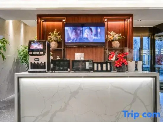Xindi Hotel (Zhengzhou Zhongyuan Wanda Store Qinling Road Subway Station)