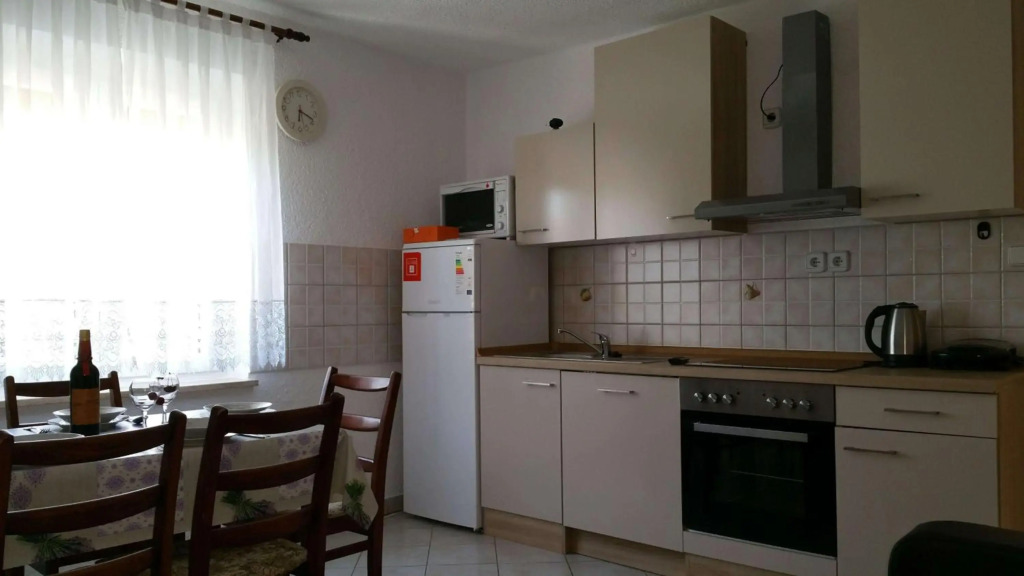 Family friendly apartments with a swimming pool Pula - 7610