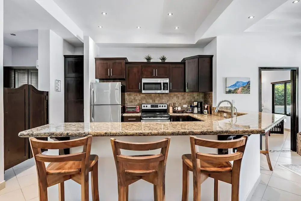Stylish Home with Chic Decor, Luxury Amenities & Tropical Outdoor Oasis with Sparkling Private Pool