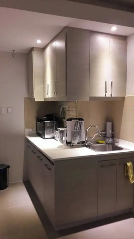 Araneta Cubao No Brown Outs 1BR Furnished Condo With Balcony Free Wifi Netflix