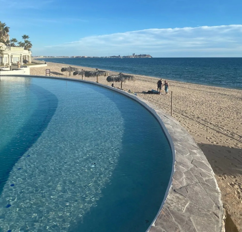 Spectacular 2 Bedroom Condo on Sandy Beach at Las Palmas Resort B-705 1 Condo by RedAwning