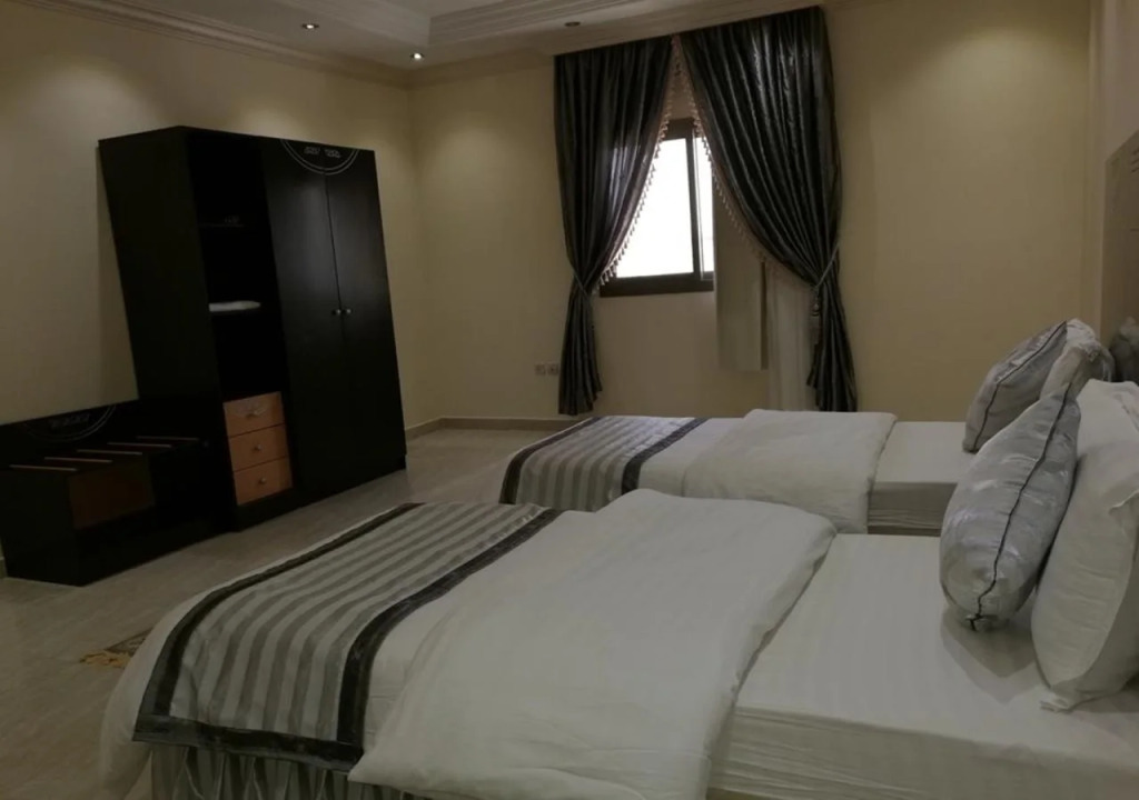 Al Ezzah Palace Hotel Suites