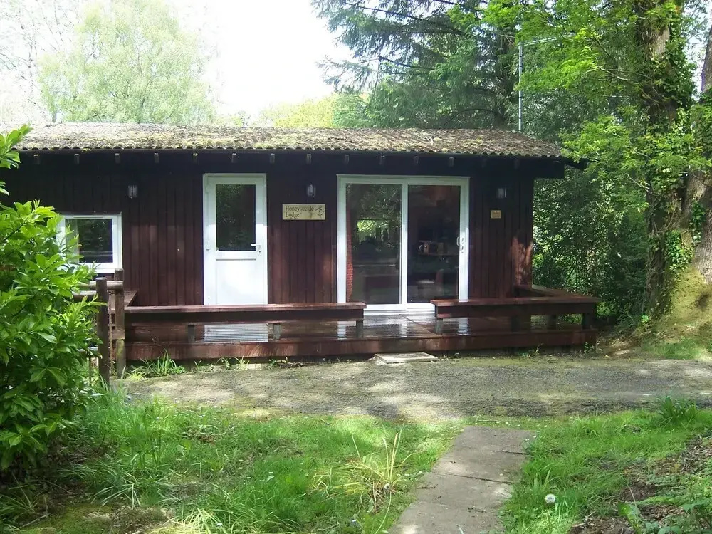 Honeysuckle Lodge set in a Beautiful 24 acre Woodland Holiday Park