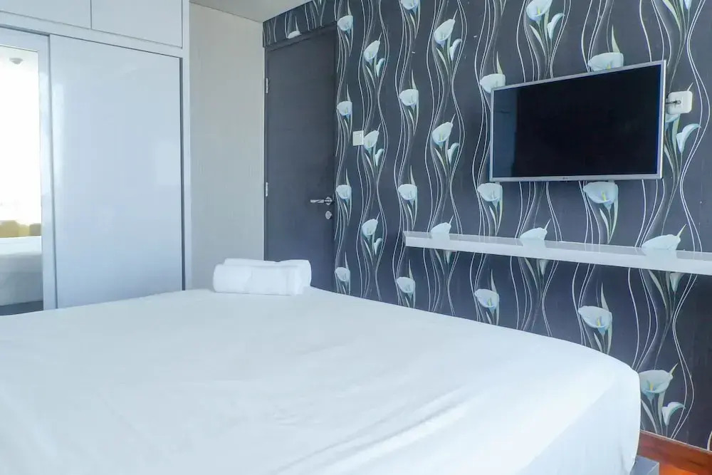 Spacious & Exquisite 1BR Apartment at Tamansari Papilio By Travelio