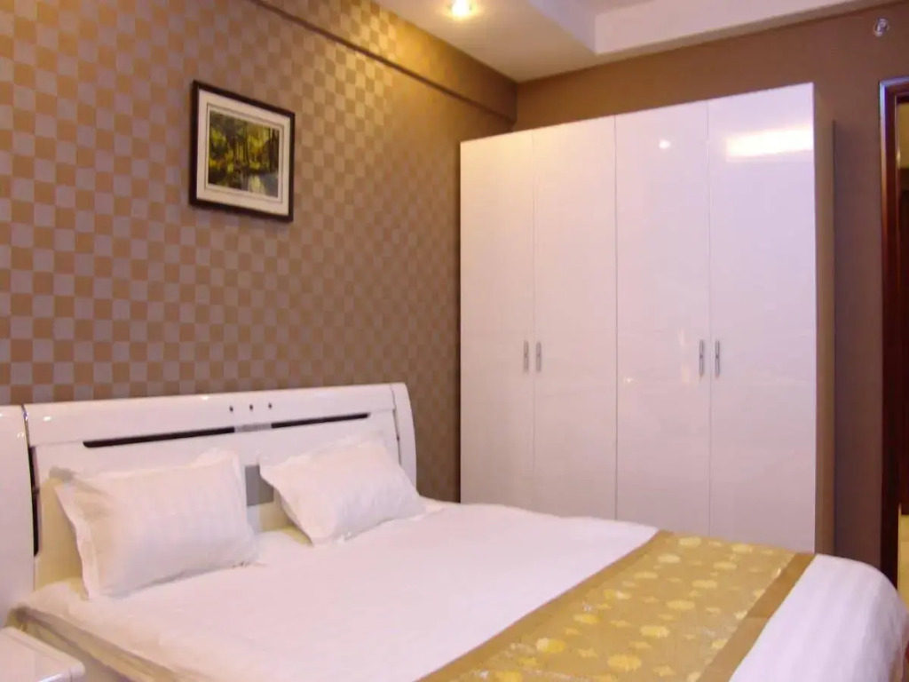 Dalian Jiuxing Apartment