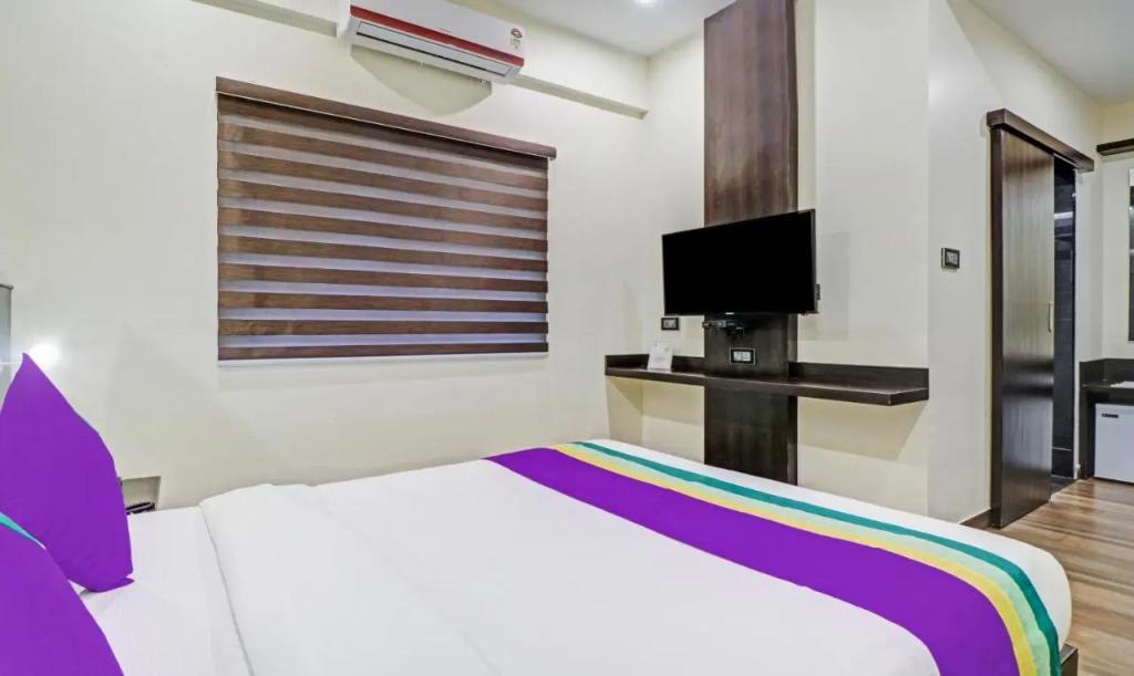Treebo Premium Raj Vista Global Village