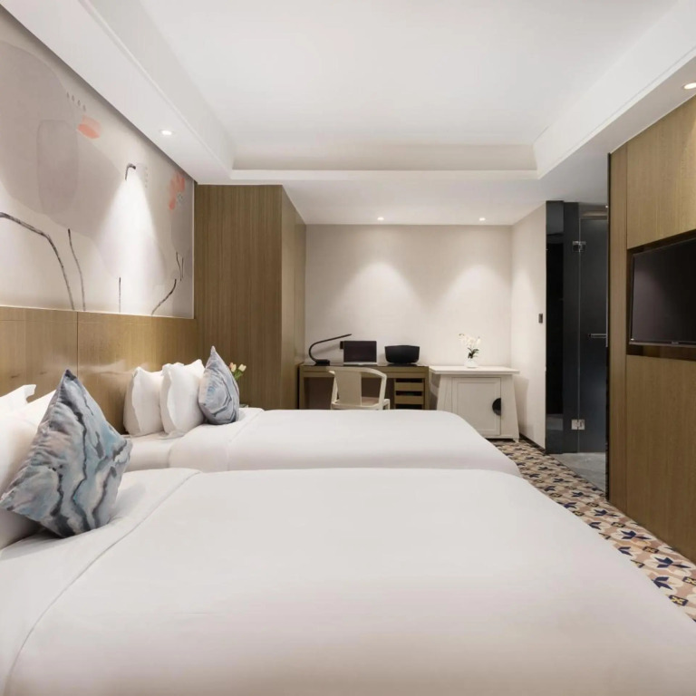 Paco Business Hotel - Longkou West