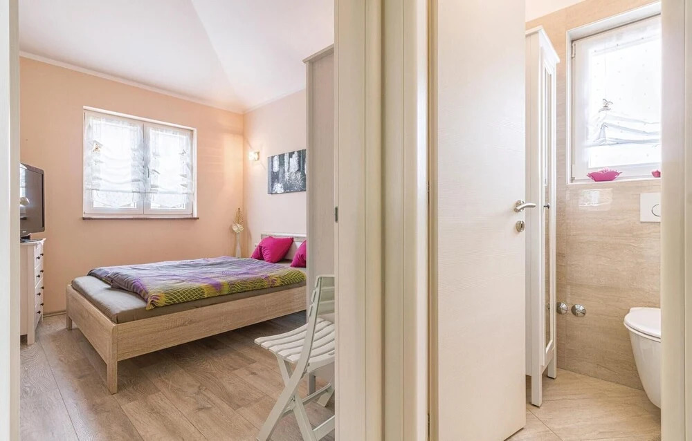 Awesome Home in Peroj With Wifi and 4 Bedrooms