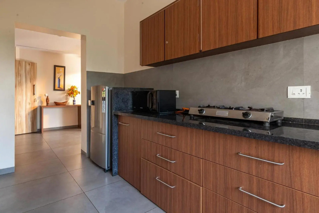Morning Dew Retreat by StayVista - Modern interiors, Indoor games, Lush greenery, Pool & Gazebo await your escape