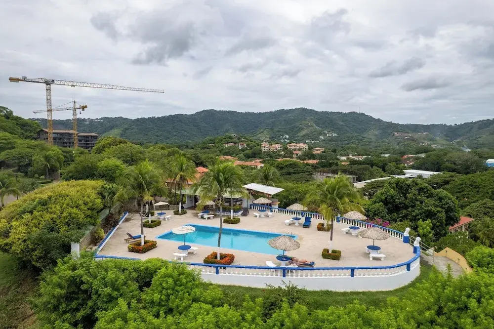 Modern Top-Floor Condo with Panoramic Views and Community Pool