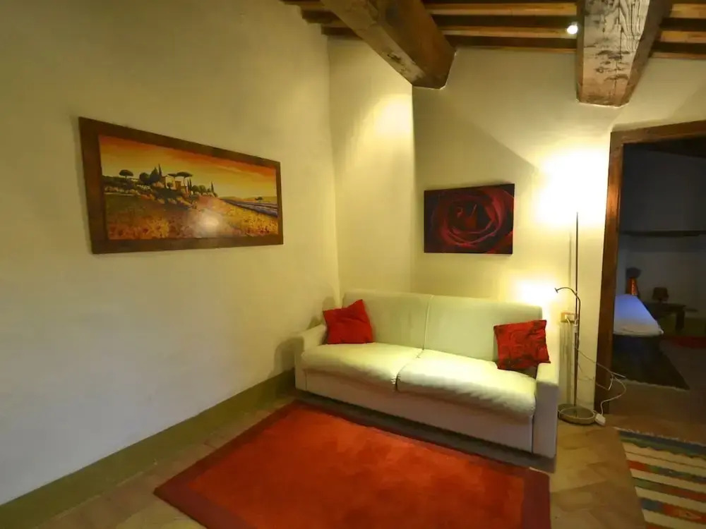 In a wonderful medieval village on the Tuscan hills, with air conditioning