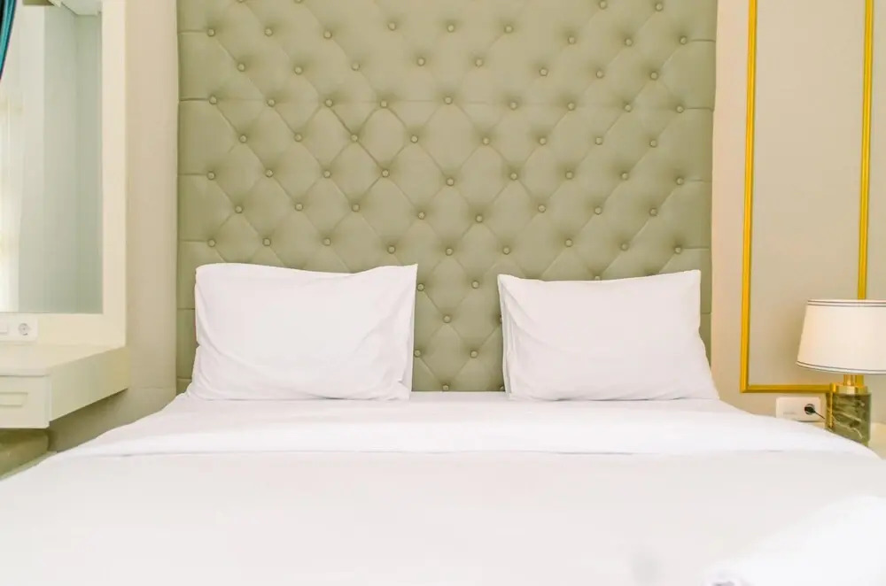 Comfort and Homey 2BR at Transpark Bintaro Apartment By Travelio