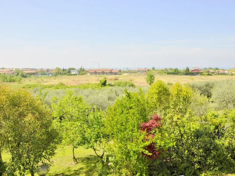 Holiday home with private garden, about 1 km from the lake