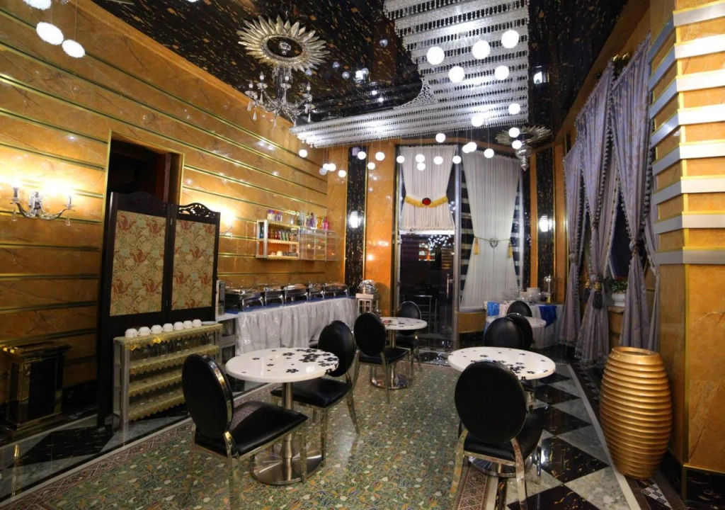Roomi Suites Hotel
