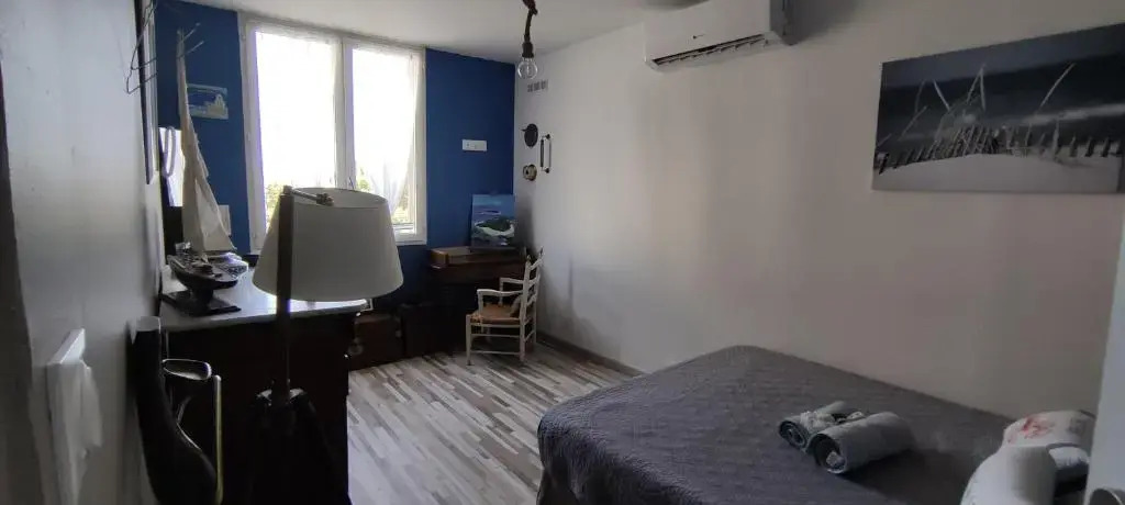 chambres côté plage, aperçu mer, proche aéroport, climatisées et parking gratuit