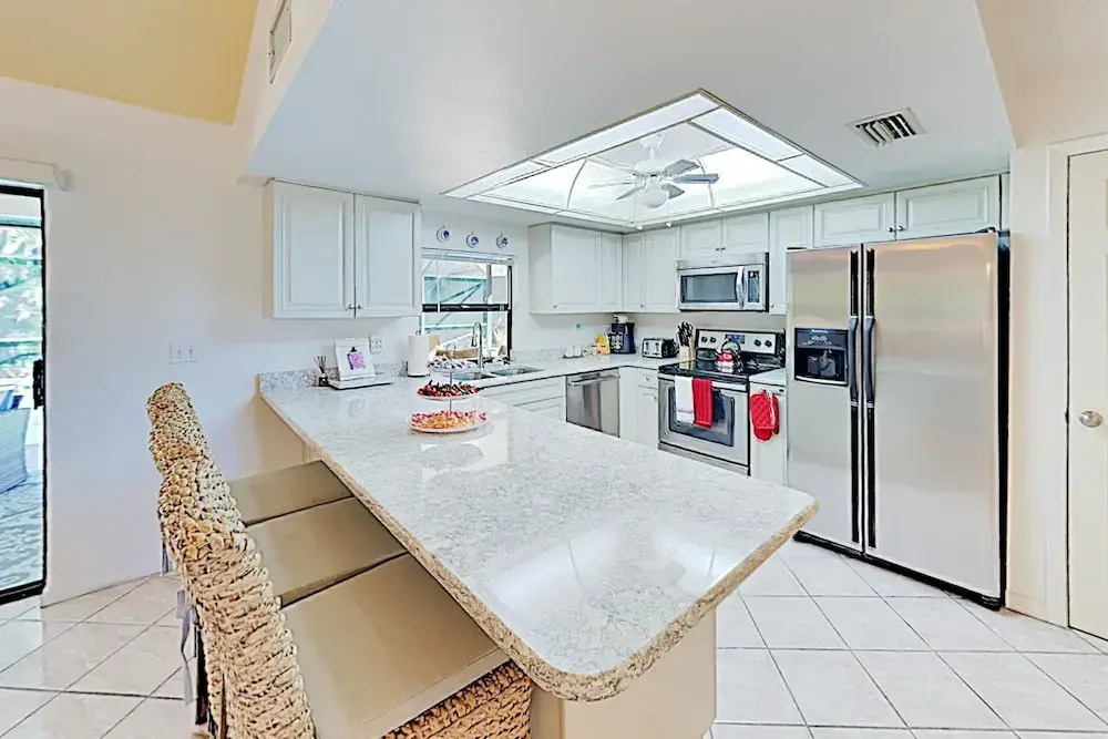 New Listing! Sparkling W/ Caged Pool & Lanai 3 Bedroom Home