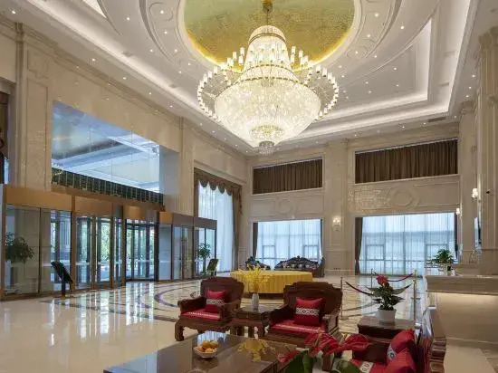 Vienna International Hotel (Zhangshu Times Square Renhe)