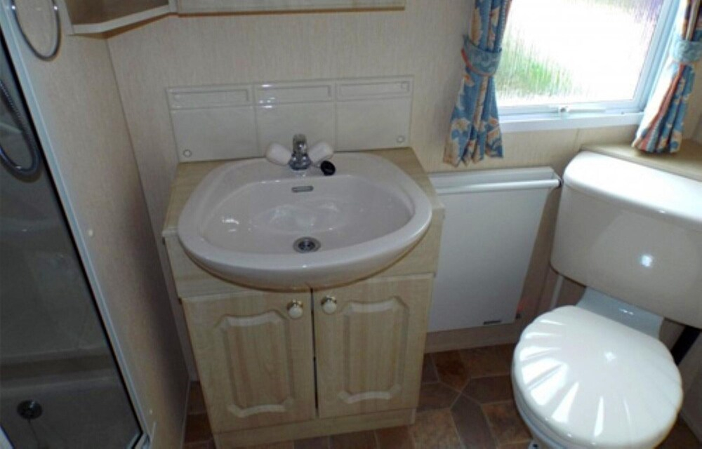 Mobile Home im Ferienpark mit Seezugang