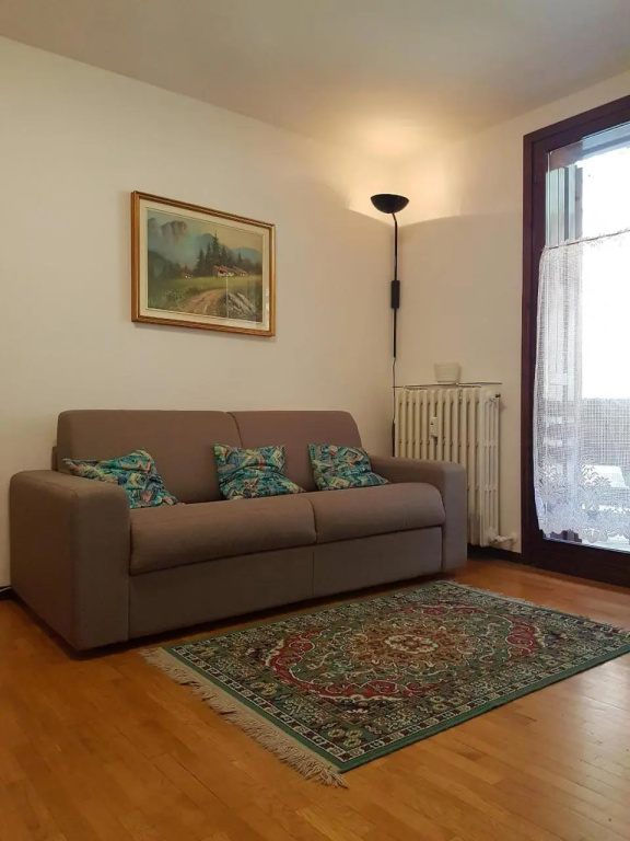 026 Bilocale con Caminetto Giustino