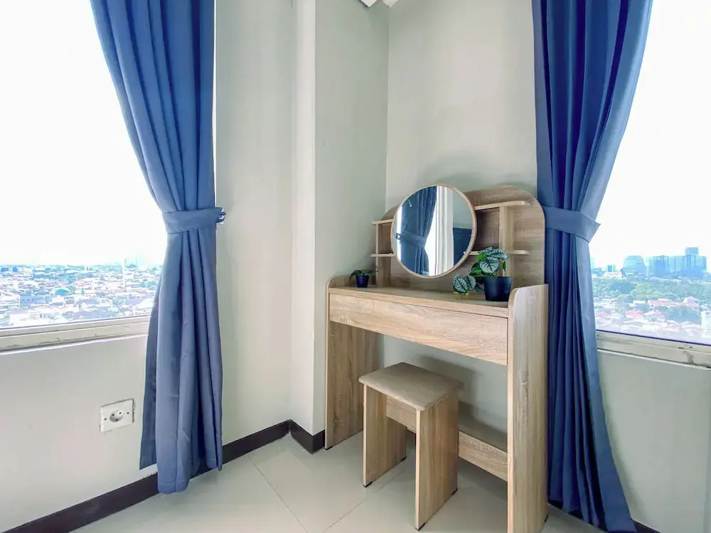 Good Designed and Homey 3BR Nifarro Park Apartment