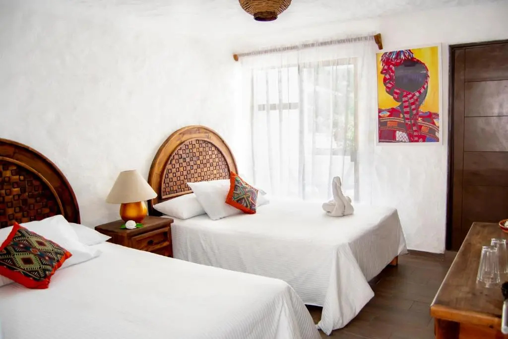 Четырёхместный люкс в Petit Hotel Pilitas