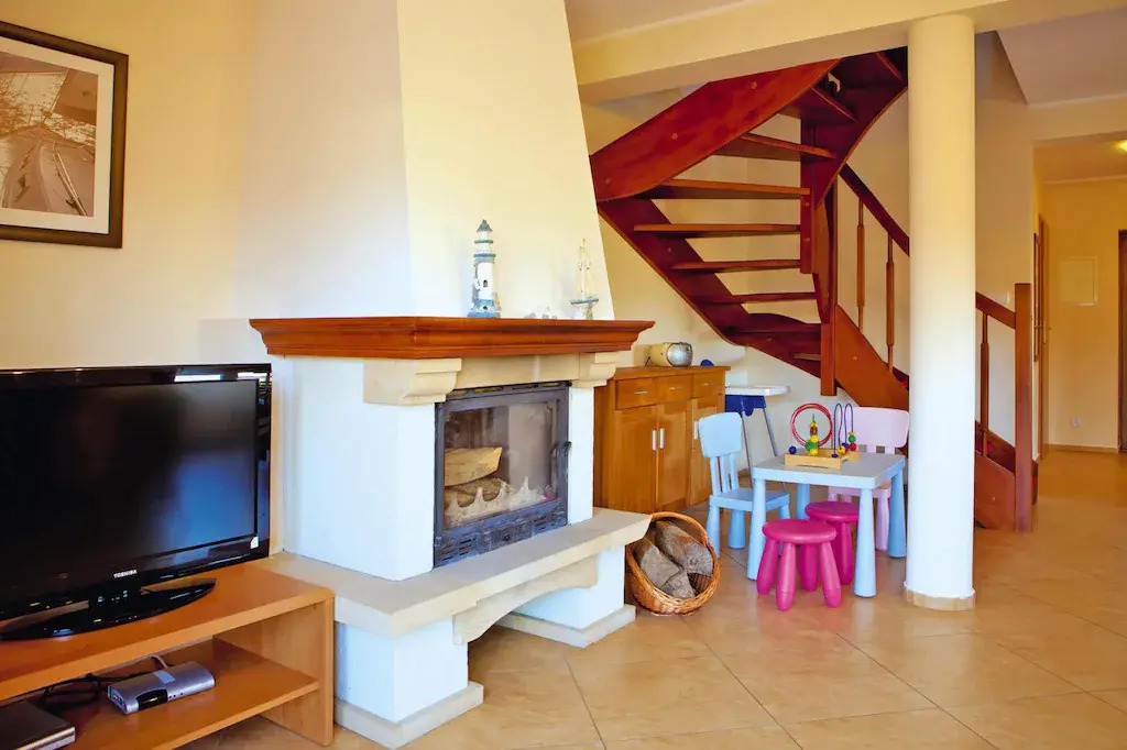Half of holiday home, terrace, playground
