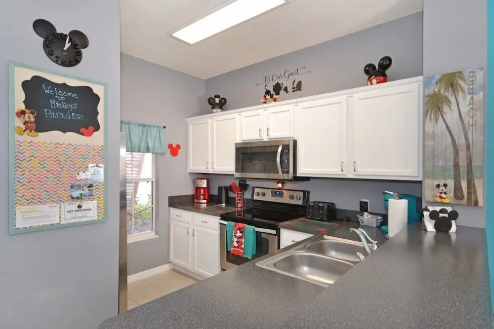 Roomy House Near Disney with Resort Pool and Patio BBQ